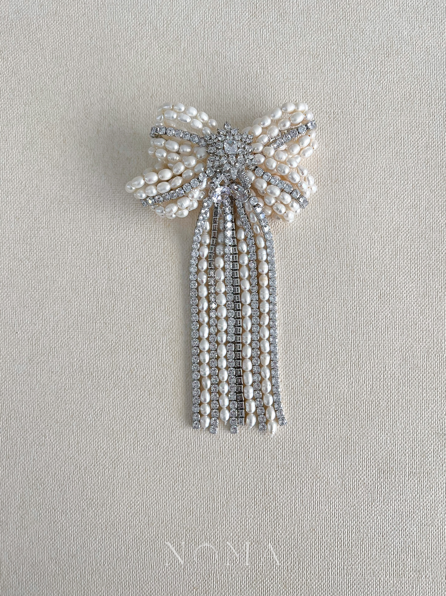 Extravagant Royal Pearl Ribbon Brooch - White Gold